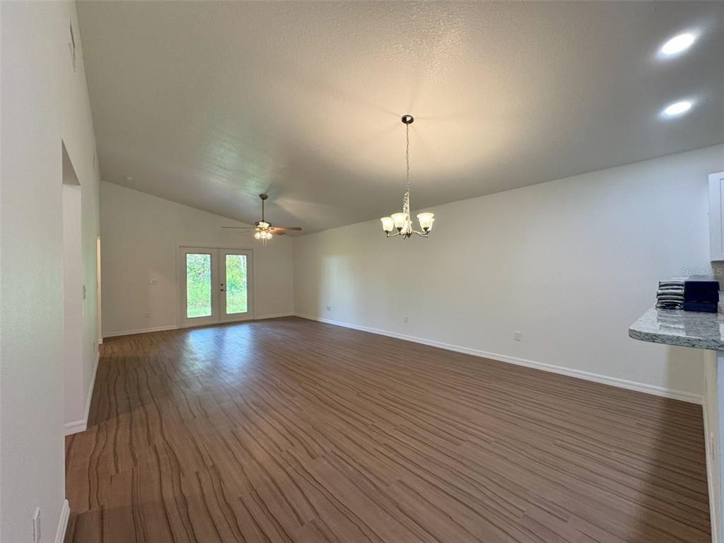 Chandelier, Empty room, Interior, Recessed Lighting, Wood Texture Flooring