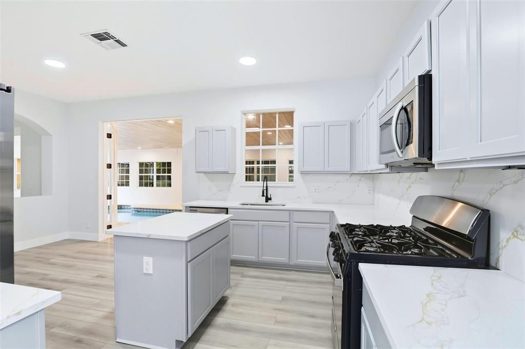 Interior, Kitchen, Marble Walls, Recessed Lighting, Wood Texture Flooring