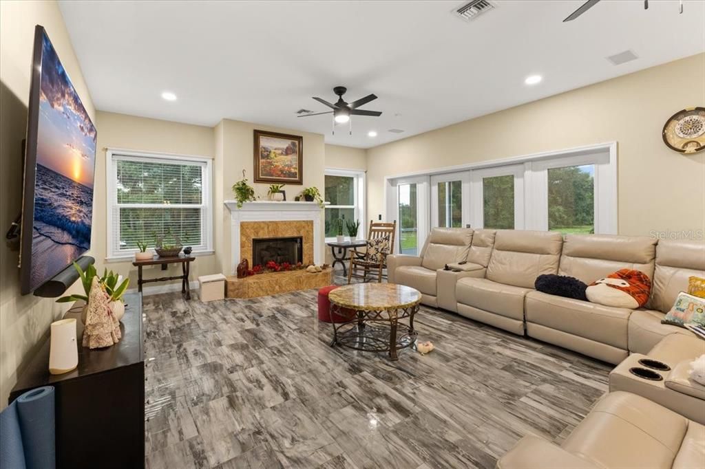 Fireplace, Interior, Living room, Recessed Lighting, Wood Texture Flooring