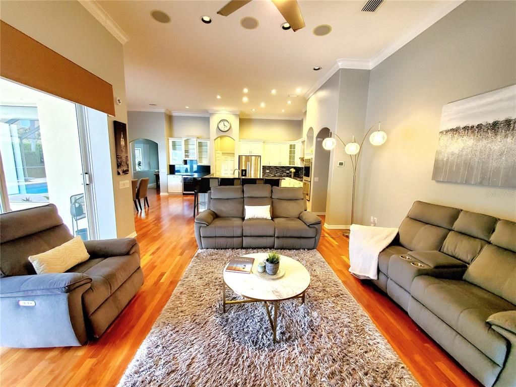 Dining room, Interior, Kitchen, Living room, Recessed Lighting, Stainless Steel Appliances, Wood Texture Flooring