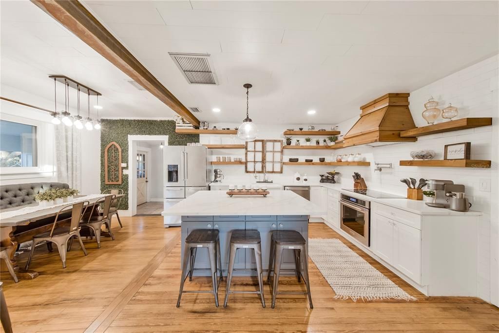 Dining room, Interior, Kitchen, Pendant Lights, Recessed Lighting, Stainless Steel Appliances, Wood Texture Flooring