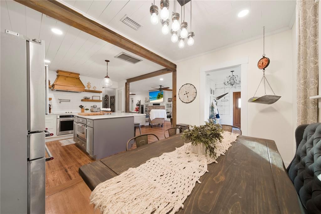 Dining room, Interior, Kitchen, Pendant Lights, Recessed Lighting, Stainless Steel Appliances, Wood Texture Flooring