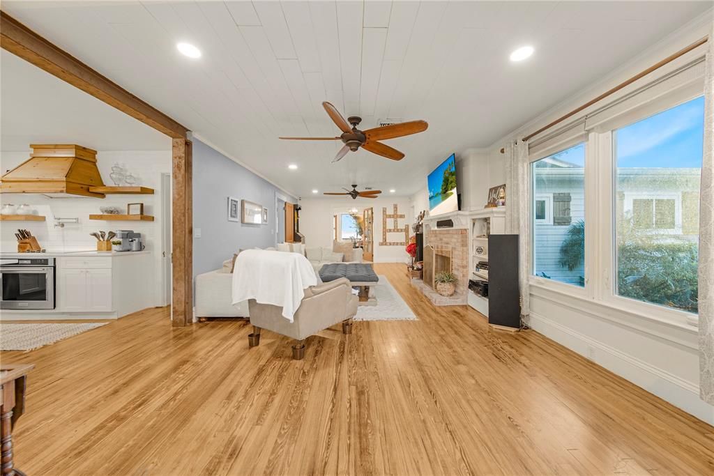 Fireplace, Interior, Living room, Recessed Lighting, Wood Texture Flooring