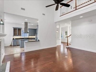 Fireplace, Interior, Kitchen, Recessed Lighting, Wood Texture Flooring
