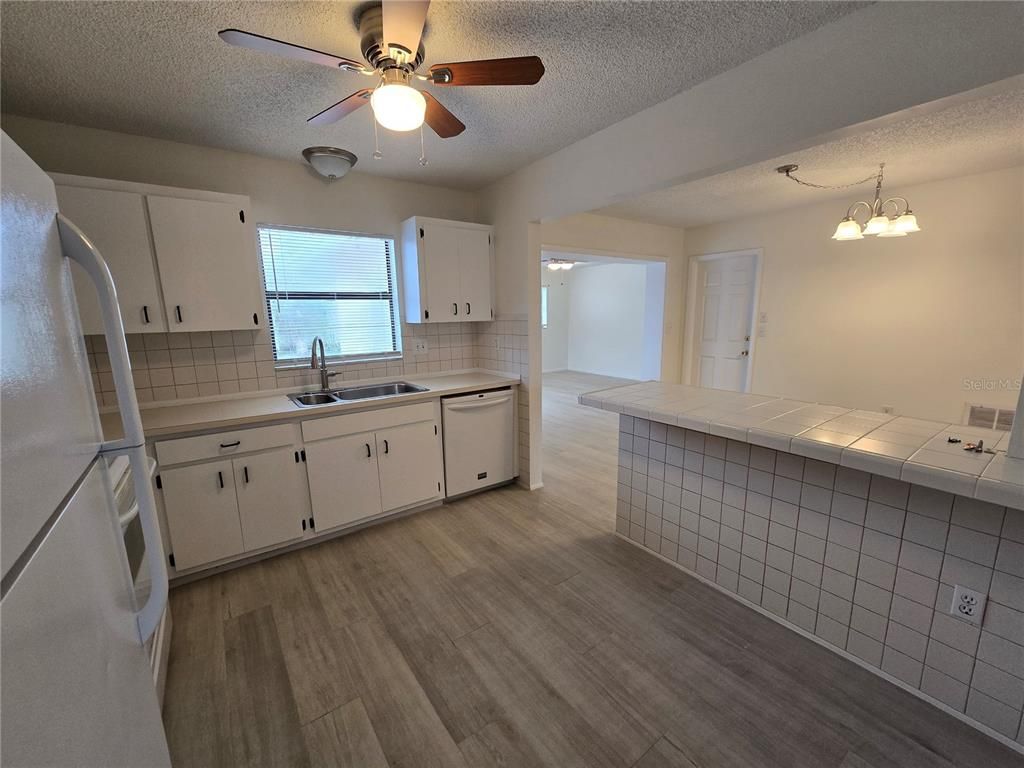 Interior, Kitchen, Tile Countertops, Wood Texture Flooring