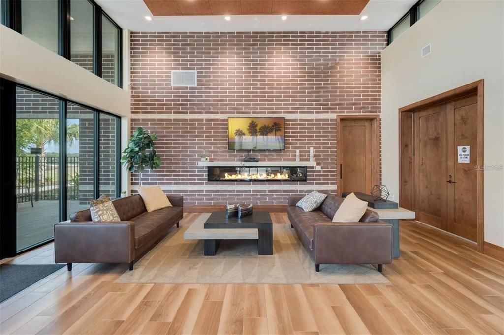 Fireplace, Interior, Living room, Recessed Lighting, Stone Walls, Wood Texture Flooring