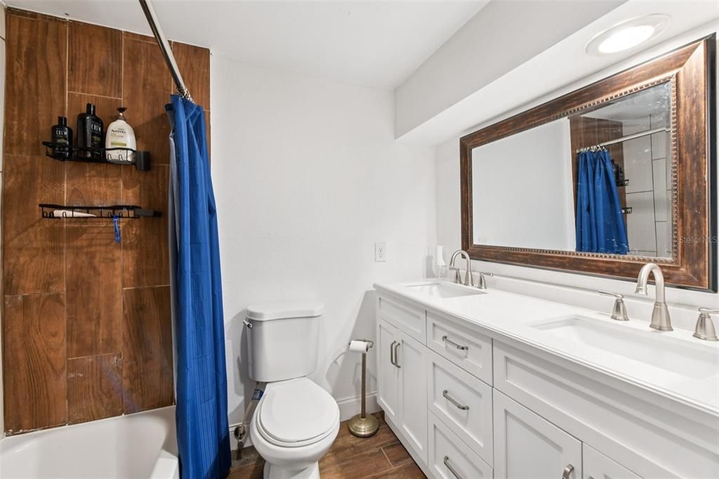 Bathroom, Dual Sink Vanities, Interior, Recessed Lighting, Wood Texture Flooring