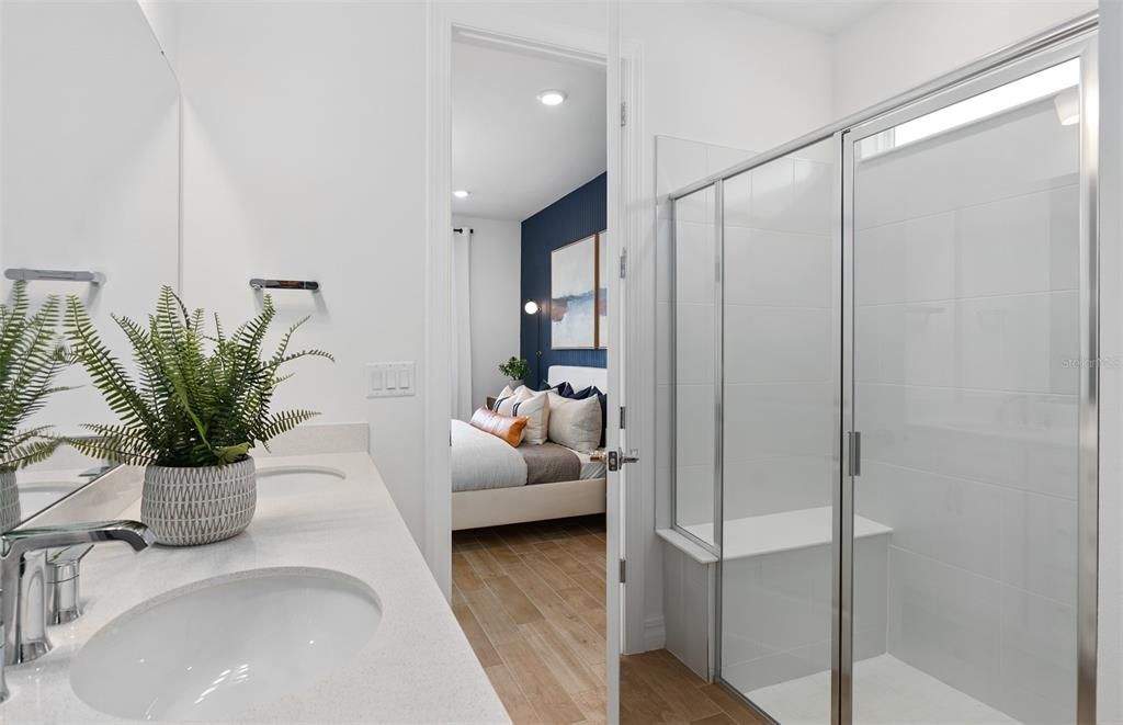 Bathroom, Bedroom, Dual Sink Vanities, Glass Shower, Interior, Recessed Lighting, Wood Texture Flooring
