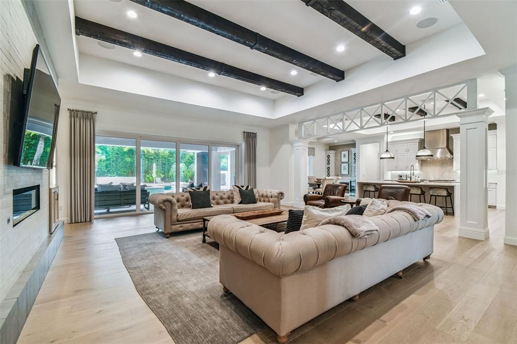 Fireplace, Interior, Kitchen, Living room, Pendant Lights, Recessed Lighting, Wooden Beams, Wood Texture Flooring