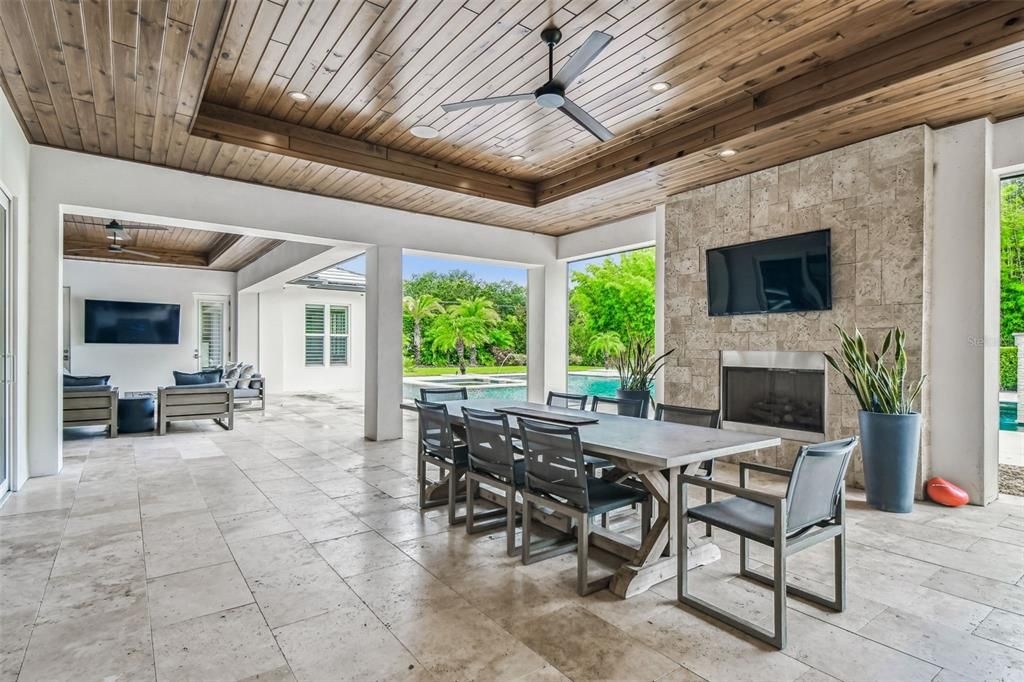 Dining room, Fireplace, Interior, Recessed Lighting, Stone Walls, Wooden Ceilings