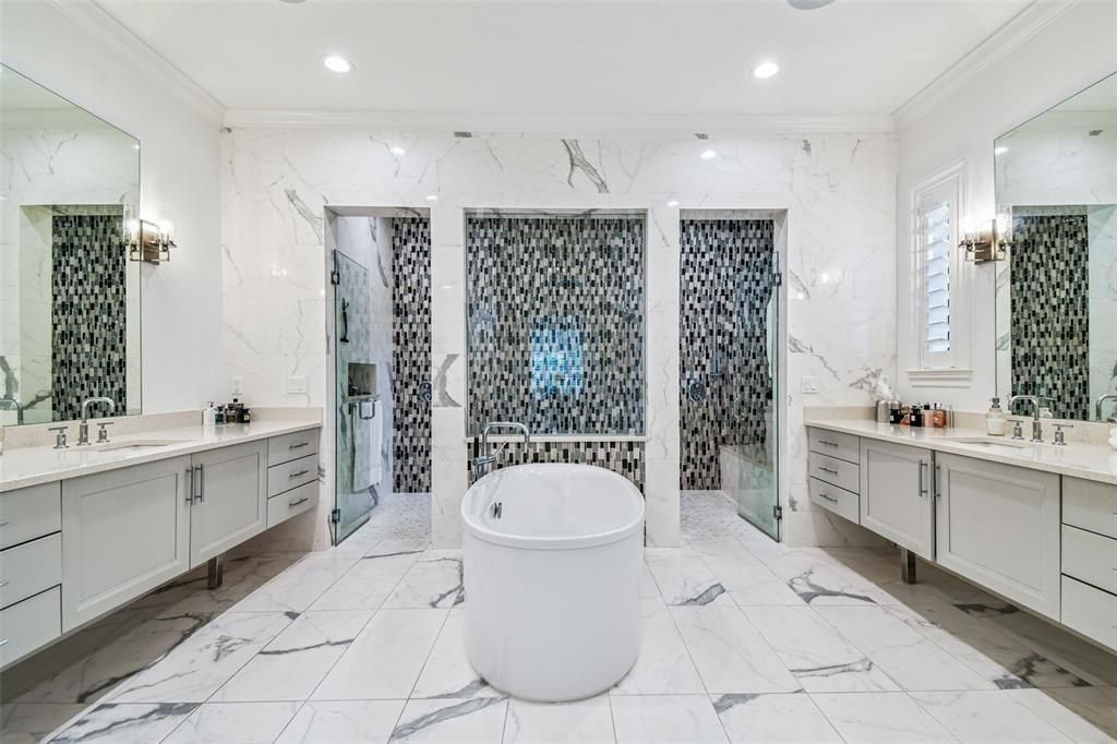 Bathroom, Dual Sink Vanities, Free Standing Baths, Glass Shower, Interior, Marble, Marble Walls, Recessed Lighting
