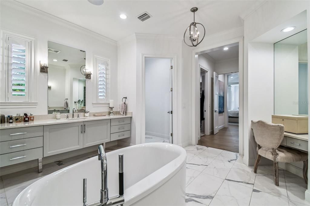 Bathroom, Dual Sink Vanities, Free Standing Baths, Interior, Marble, Pendant Lights, Recessed Lighting, Wood Texture Flooring