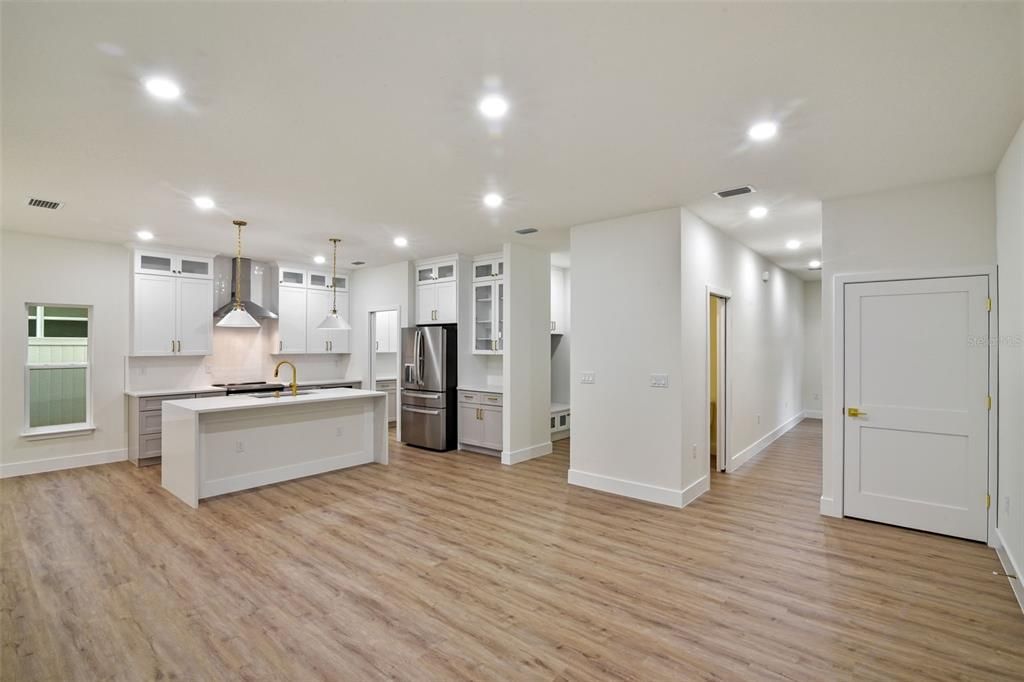 Interior, Kitchen, Pendant Lights, Recessed Lighting, Stainless Steel Appliances, Wood Texture Flooring