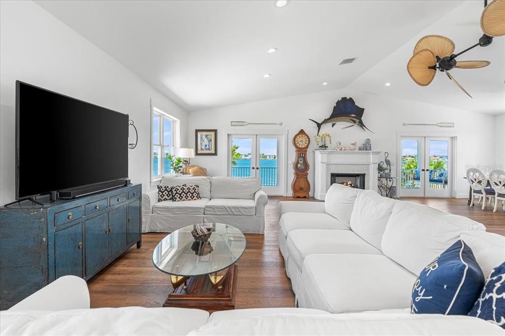 Fireplace, Interior, Living room, Recessed Lighting, Water, Wood Texture Flooring