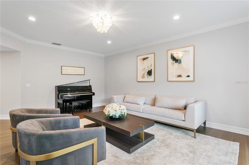 Chandelier, Interior, Living room, Piano, Recessed Lighting, Wood Texture Flooring
