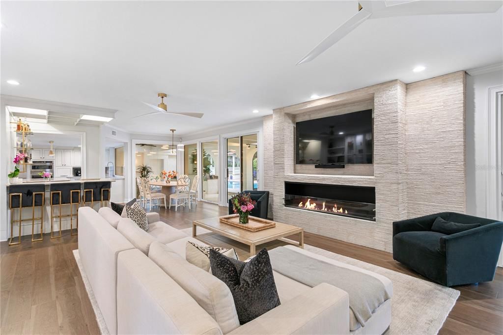 Dining room, Fireplace, Interior, Kitchen, Living room, Pendant Lights, Recessed Lighting, Wood Texture Flooring