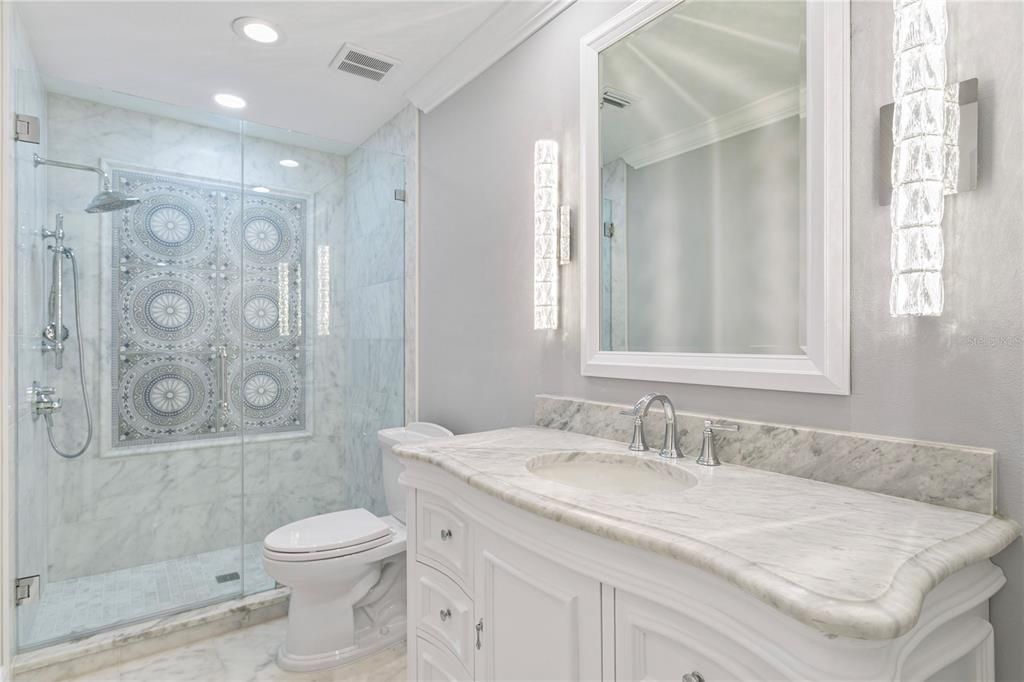 Bathroom, Glass Shower, Interior, Marble, Recessed Lighting, Tile Countertops