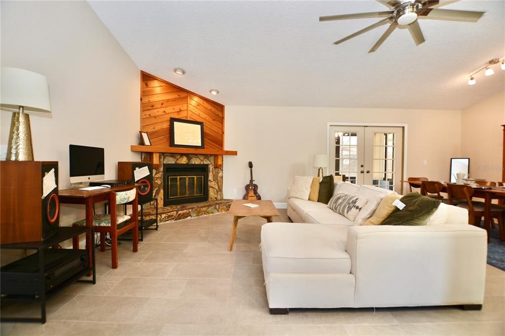 Dining room, Fireplace, Interior, Living room, Recessed Lighting, Wooden Walls