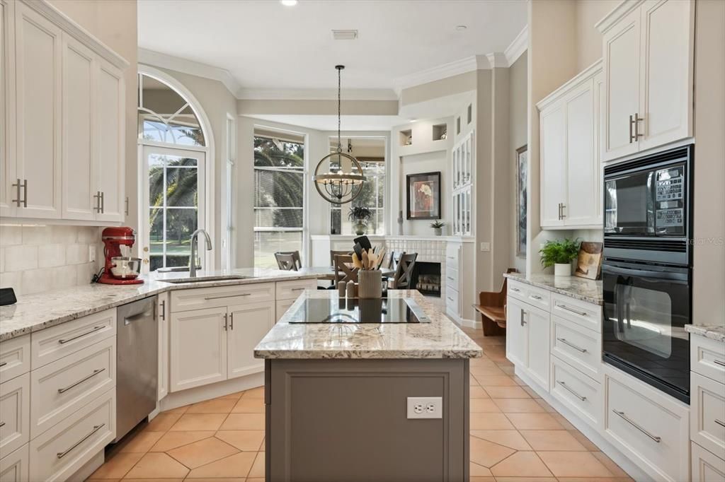 Chandelier, Fireplace, Interior, Kitchen, Pendant Lights, Recessed Lighting, Stainless Steel Appliances