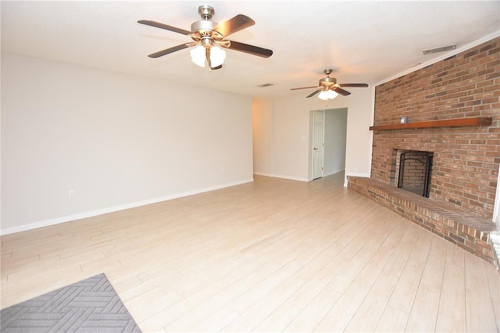 Empty room, Fireplace, Interior, Stone Walls, Wood Texture Flooring