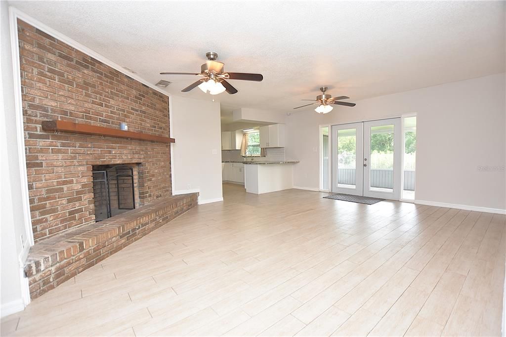 Empty room, Fireplace, Interior, Kitchen, Stone Walls, Wood Texture Flooring