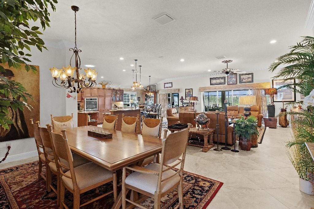 Chandelier, Dining room, Interior, Kitchen, Living room, Pendant Lights, Recessed Lighting, Stainless Steel Appliances