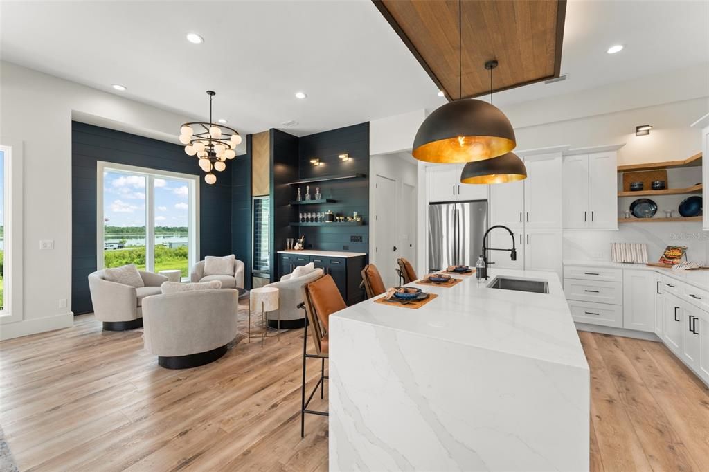 Dining room, Interior, Kitchen, Living room, Pendant Lights, Recessed Lighting, Stainless Steel Appliances, Wood Texture Flooring