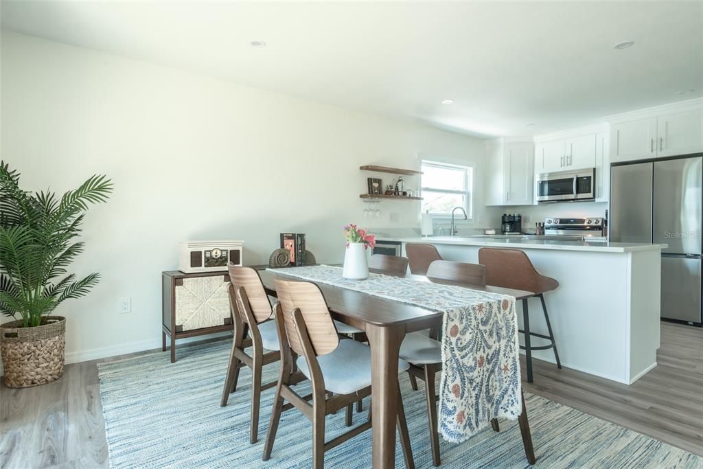 Dining room, Interior, Kitchen, Recessed Lighting, Stainless Steel Appliances, Wood Texture Flooring