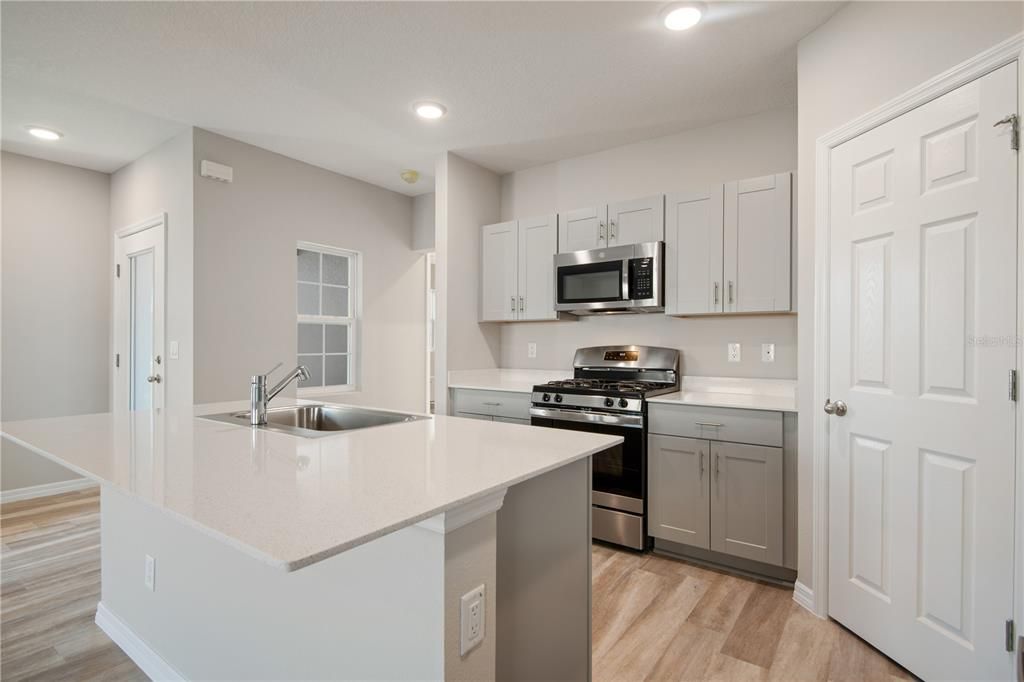 Interior, Kitchen, Recessed Lighting, Stainless Steel Appliances, Wood Texture Flooring
