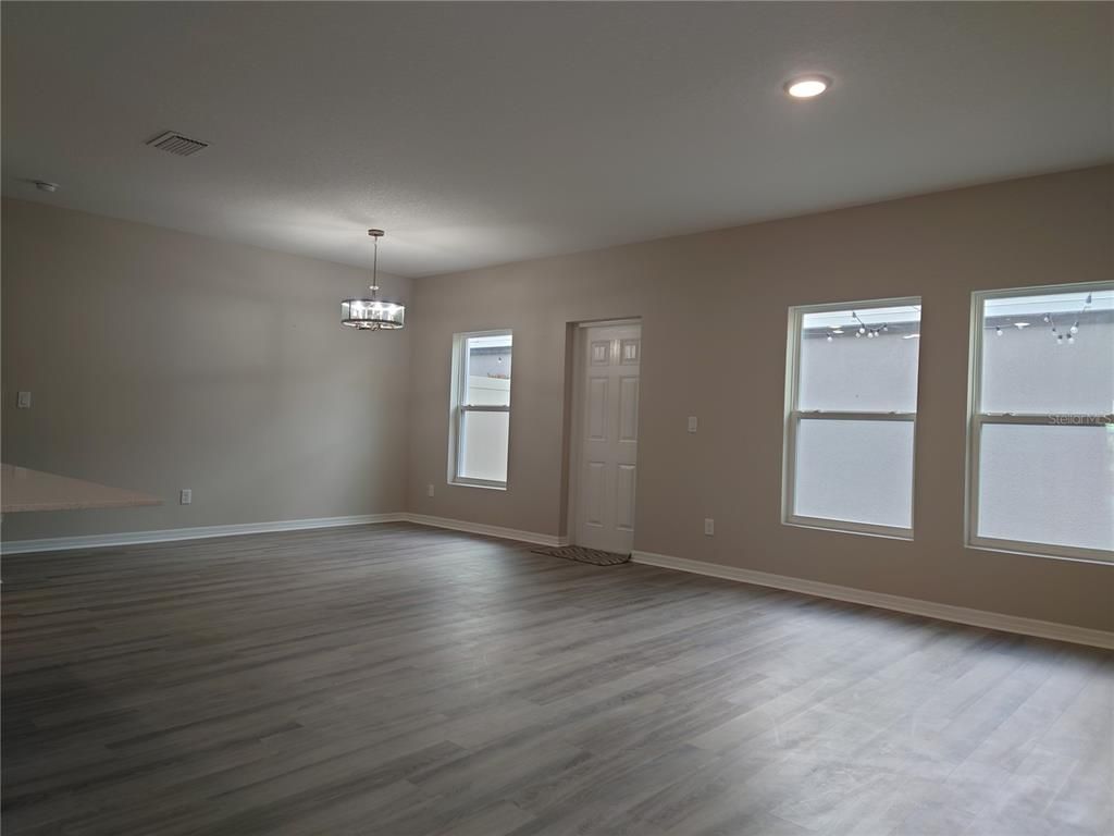 Chandelier, Empty room, Interior, Recessed Lighting, Wood Texture Flooring