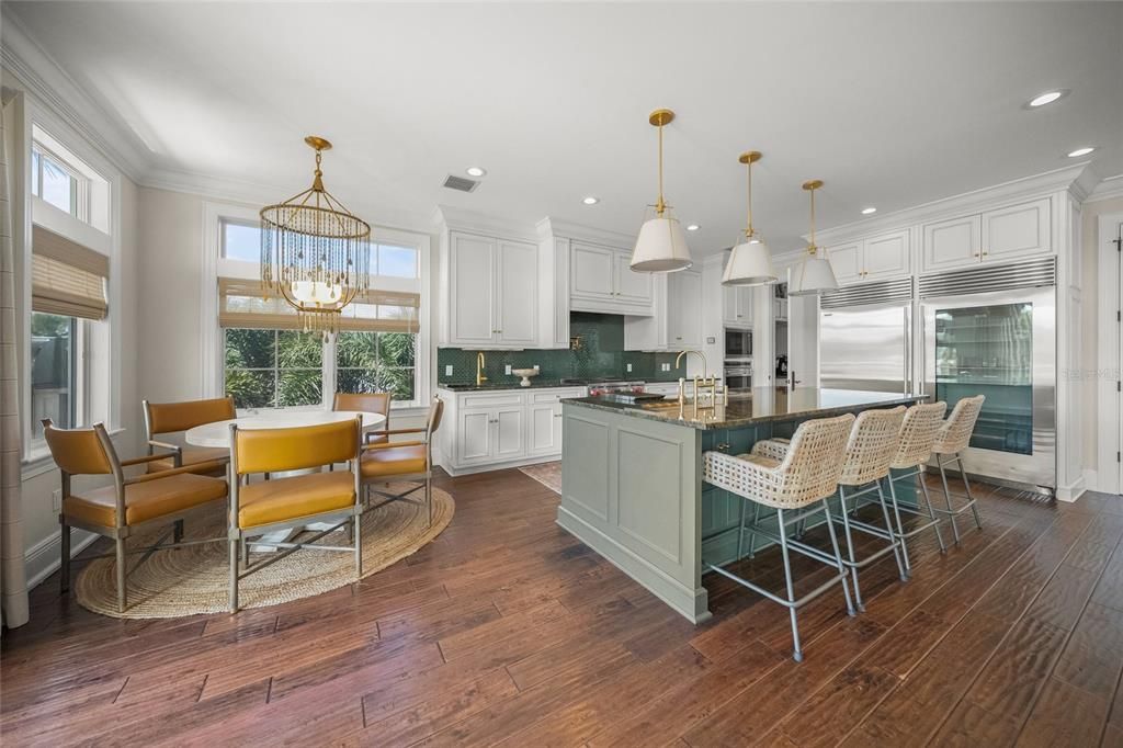 Chandelier, Dining room, Interior, Kitchen, Pendant Lights, Recessed Lighting, Stainless Steel Appliances, Wood Texture Flooring