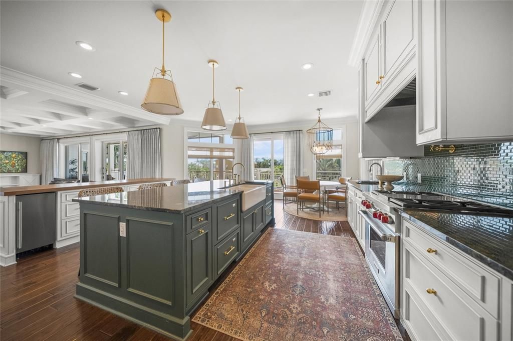 Chandelier, Dining room, Interior, Kitchen, Pendant Lights, Recessed Lighting, Stainless Steel Appliances, Wood Texture Flooring