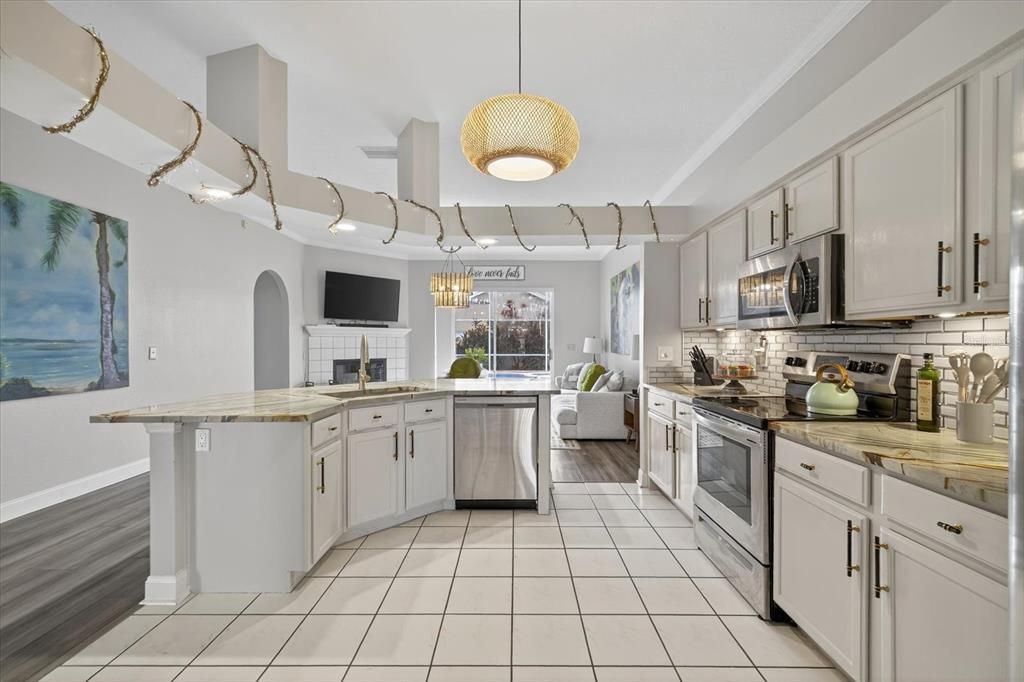 Fireplace, Interior, Kitchen, Pendant Lights, Stainless Steel Appliances
