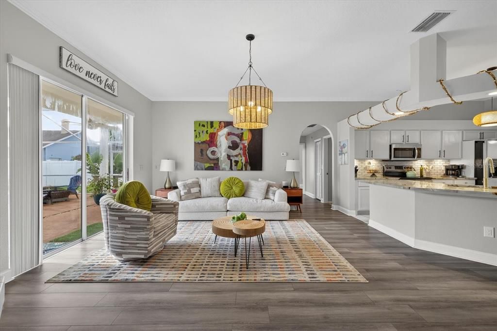 Chandelier, Interior, Kitchen, Living room, Pendant Lights, Stainless Steel Appliances, Wood Texture Flooring