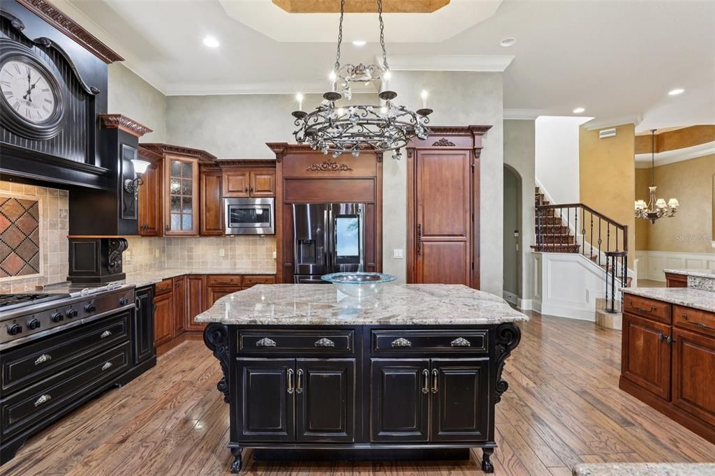 Chandelier, Interior, Kitchen, Pendant Lights, Recessed Lighting, Stainless Steel Appliances, Wood Texture Flooring