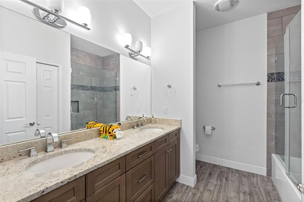 Bathroom, Dual Sink Vanities, Glass Shower, Interior, Wood Texture Flooring