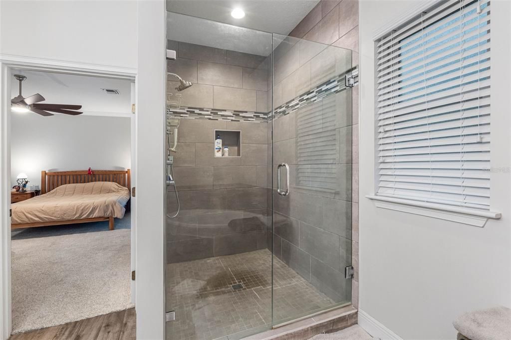 Bathroom, Bedroom, Glass Shower, Interior, Recessed Lighting, Wood Texture Flooring