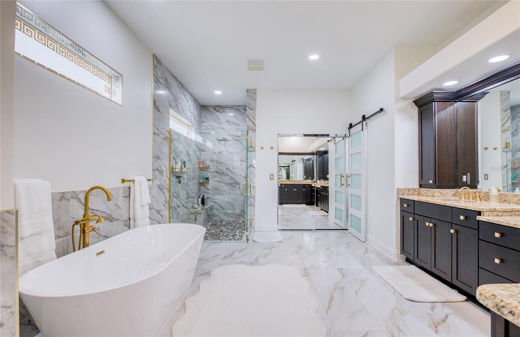 Bathroom, Dual Sink Vanities, Free Standing Baths, Glass Shower, Interior, Marble, Marble Walls, Recessed Lighting