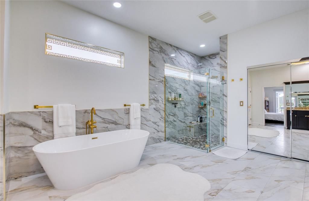 Bathroom, Free Standing Baths, Glass Shower, Interior, Marble, Marble Walls, Recessed Lighting