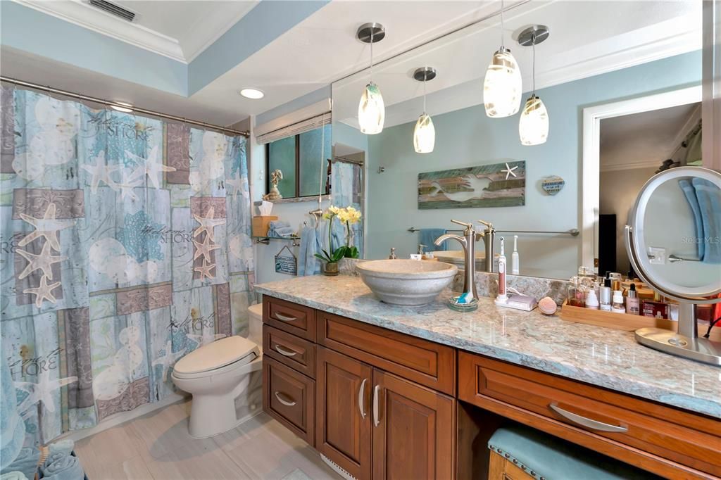 Bathroom, Dual Sink Vanities, Interior, Pendant Lights, Recessed Lighting, Wood Texture Flooring