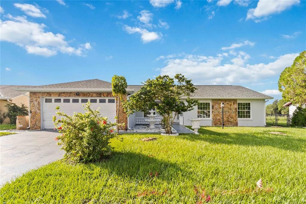Attached, Backyard, Exterior, Facade, Brick Facade, Ranch
