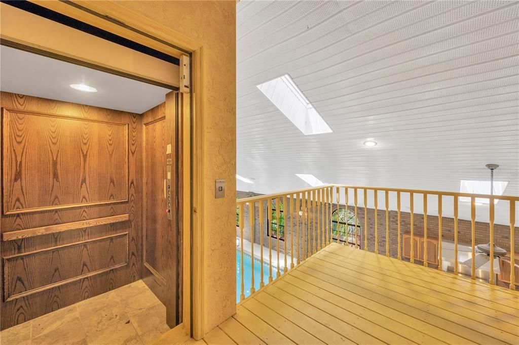 Elevator, Interior, Recessed Lighting, Wood Texture Flooring, Wooden Walls