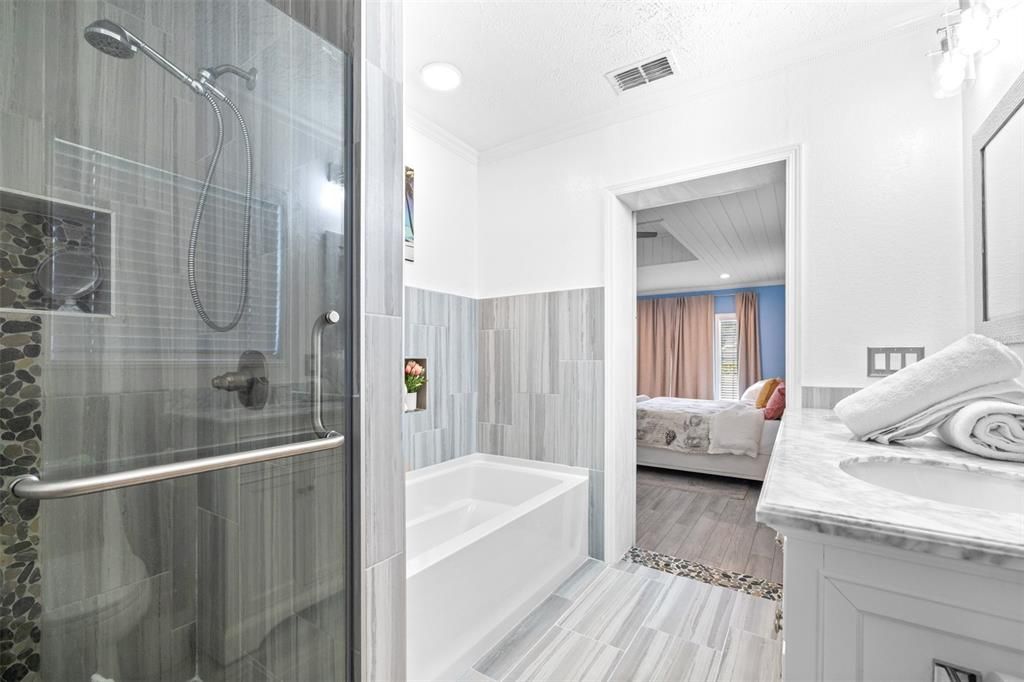 Bathroom, Bedroom, Glass Shower, Interior, Recessed Lighting, Wood Texture Flooring