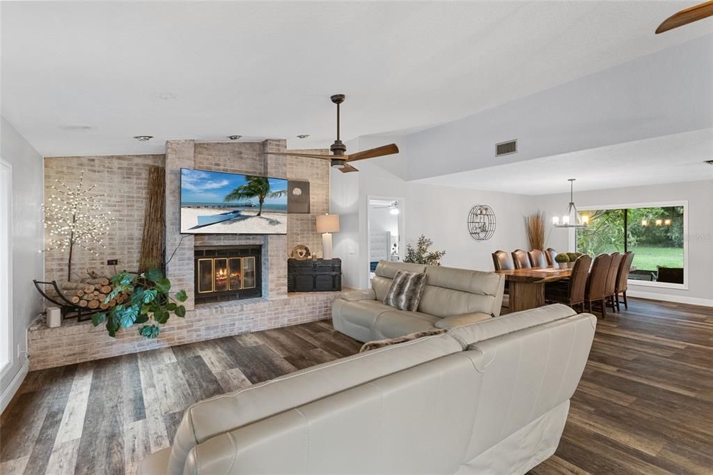 Dining room, Fireplace, Interior, Living room, Pendant Lights, Stone Walls, Wood Texture Flooring
