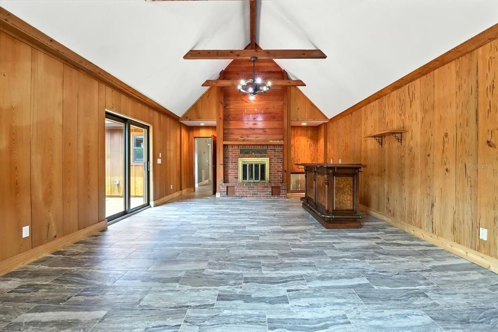 Empty room, Fireplace, Interior, Pendant Lights, Wooden Beams, Wooden Walls