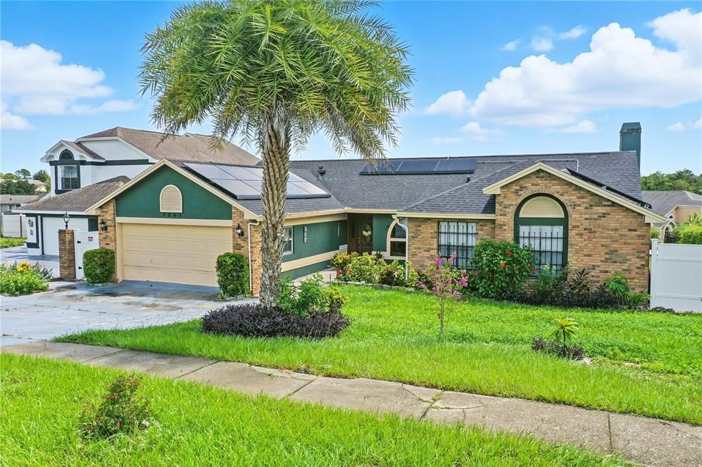 Attached, Exterior, Facade, Brick Facade, Solar Panels, Ranch