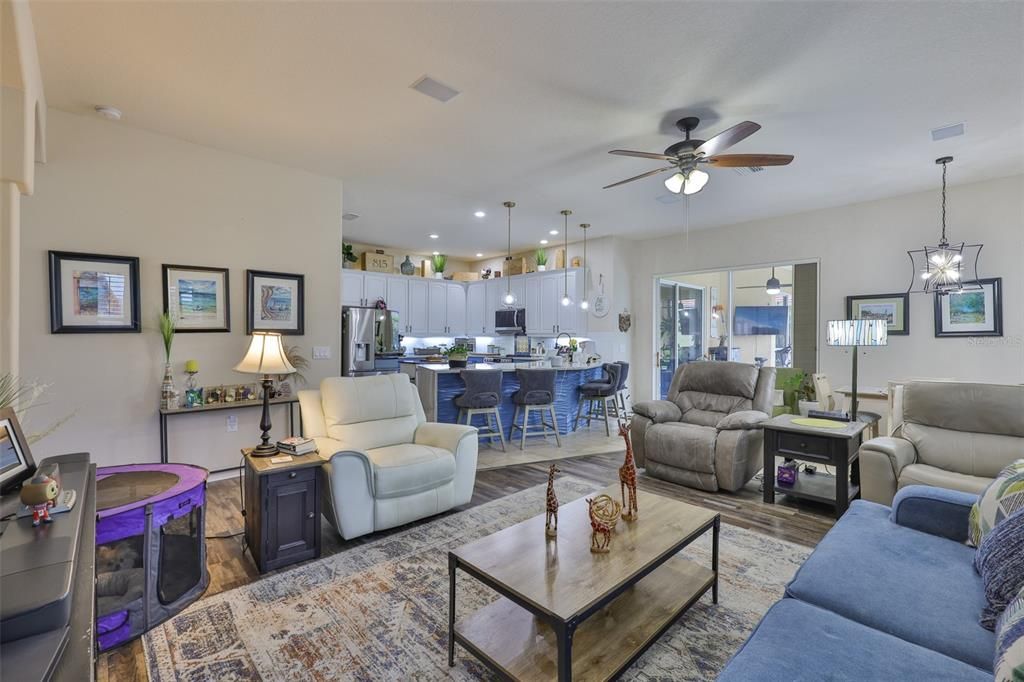 Dining room, Interior, Kitchen, Living room, Pendant Lights, Recessed Lighting, Stainless Steel Appliances, Wood Texture Flooring