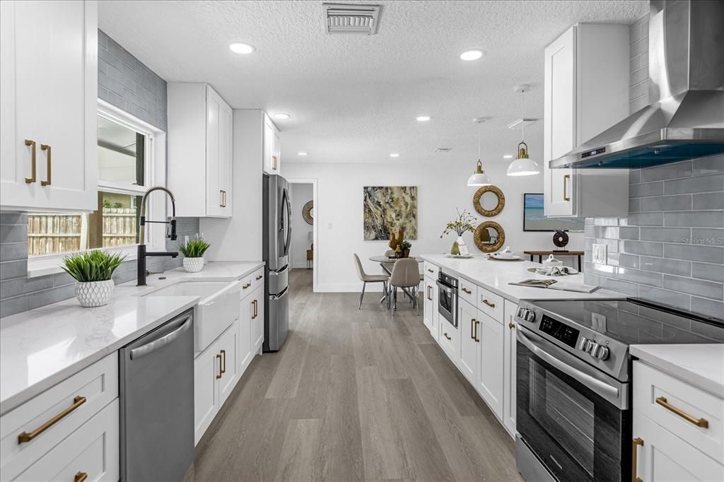 Dining room, Interior, Kitchen, Pendant Lights, Recessed Lighting, Stainless Steel Appliances, Wood Texture Flooring