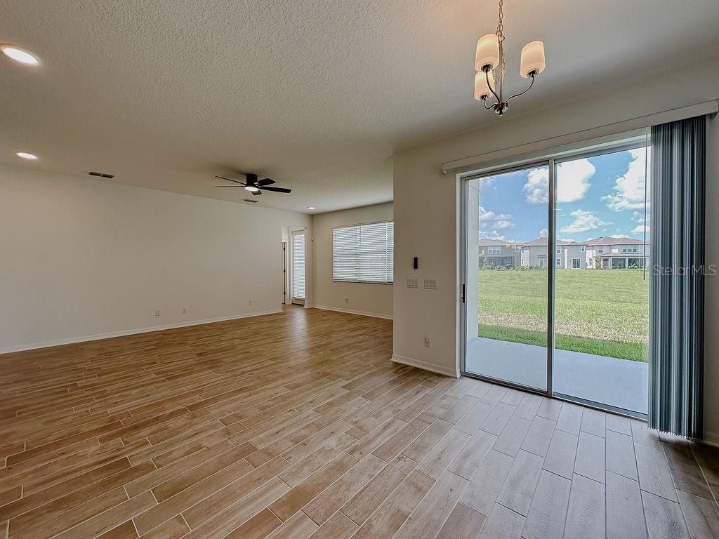 Chandelier, Empty room, Interior, Recessed Lighting, Wood Texture Flooring
