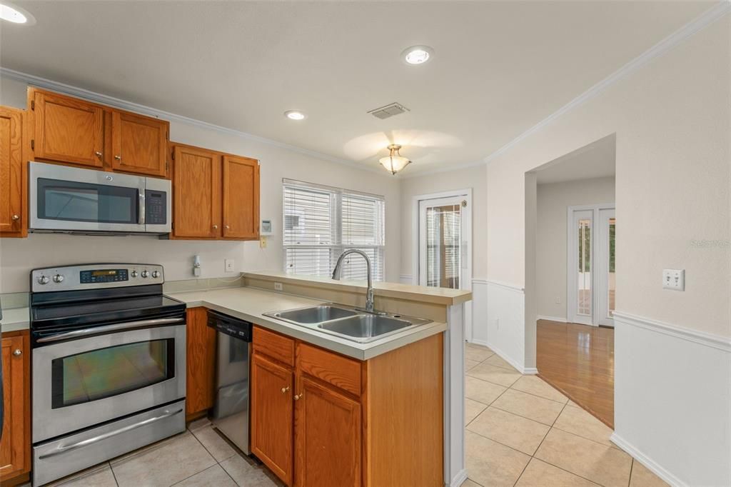Interior, Kitchen, Recessed Lighting, Stainless Steel Appliances, Wood Texture Flooring